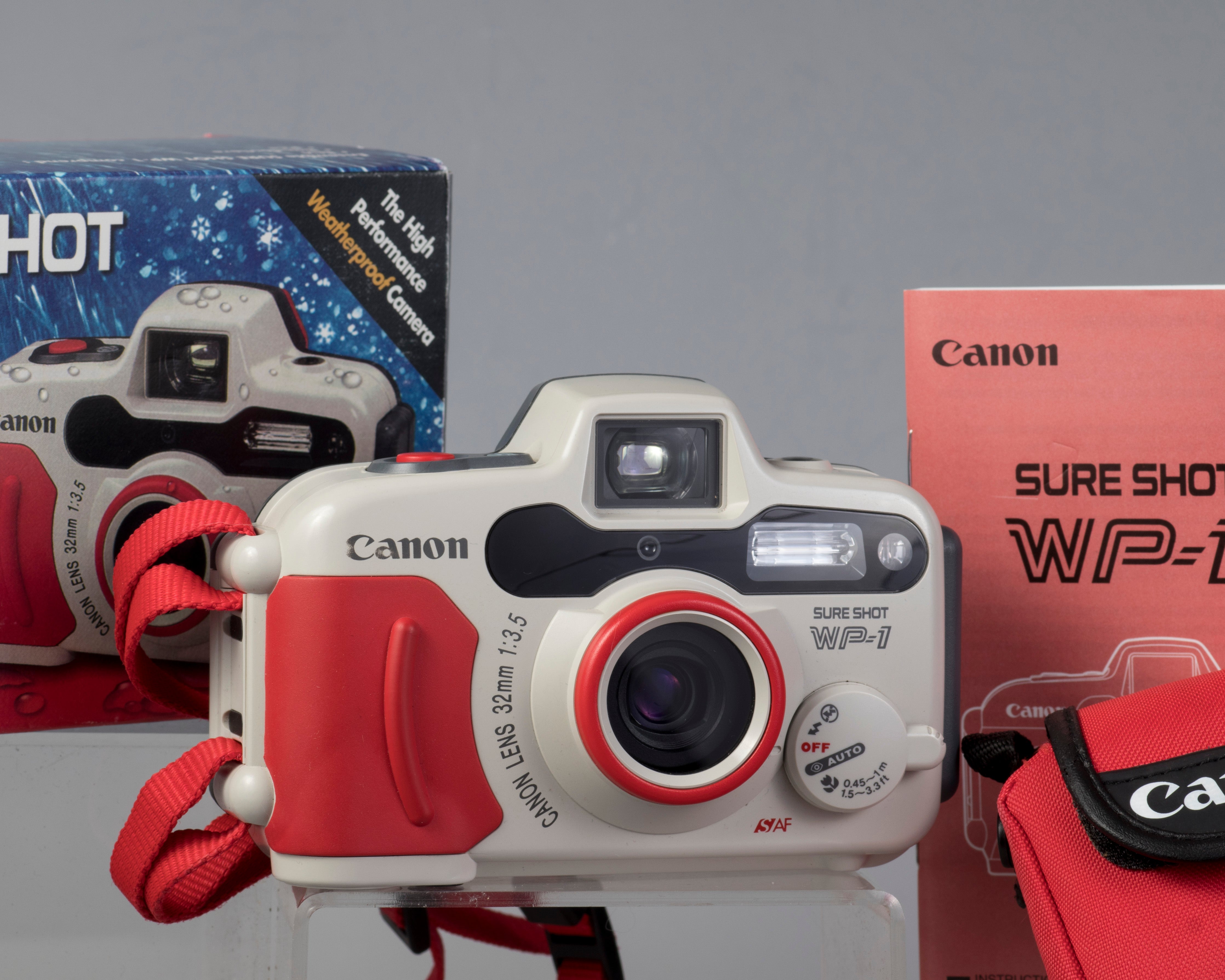 Canon Sure Shot WP-1 waterproof camera outfit w/original box, case