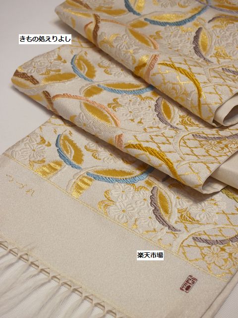 楽天市場】丸勇謹製 礼装用袋帯 唐織つづれ袋帯 六通柄 変わり雪輪と桜