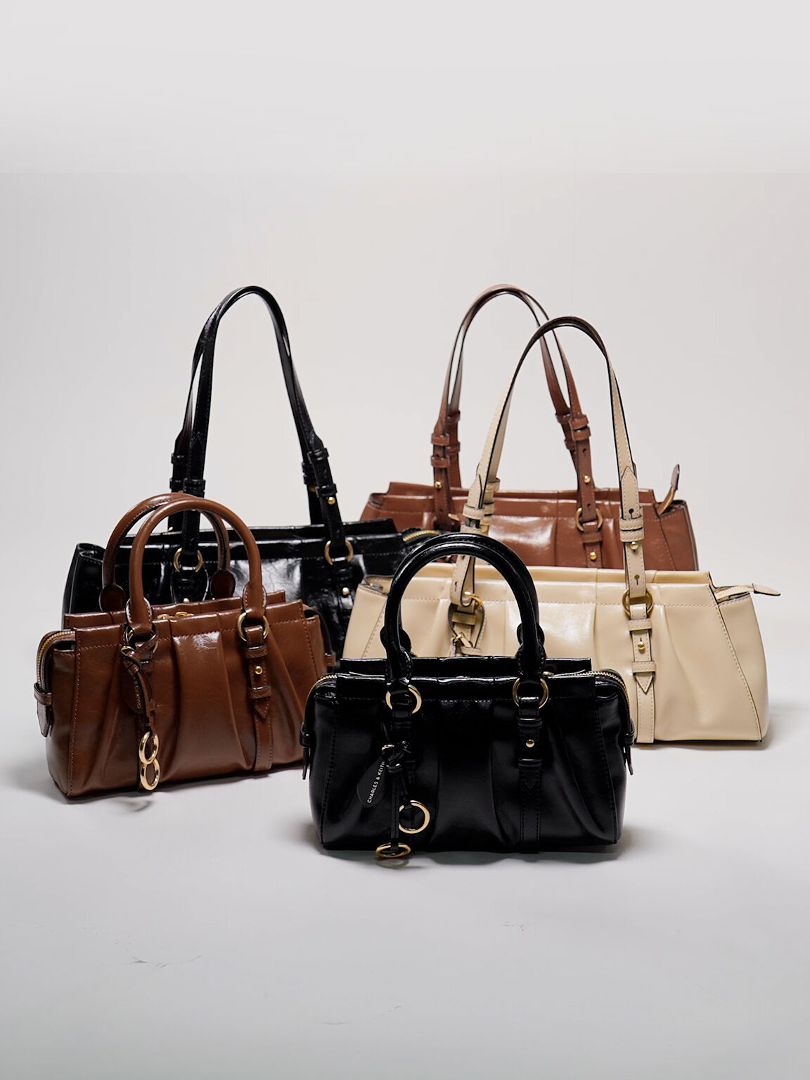 Britton ブリットン ルーシュドトップハンドルトートバッグ