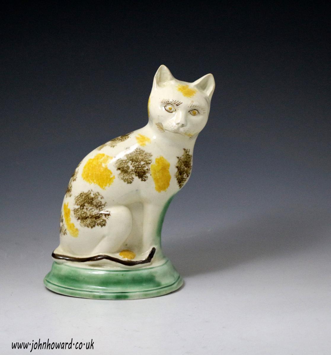 Antique English pottery figure of a seated cat, circa 1780 | BADA