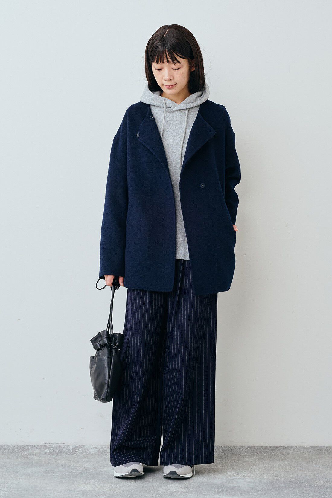 THREE FIFTY STANDARD リバー仕立てのウール混ノーカラーコート