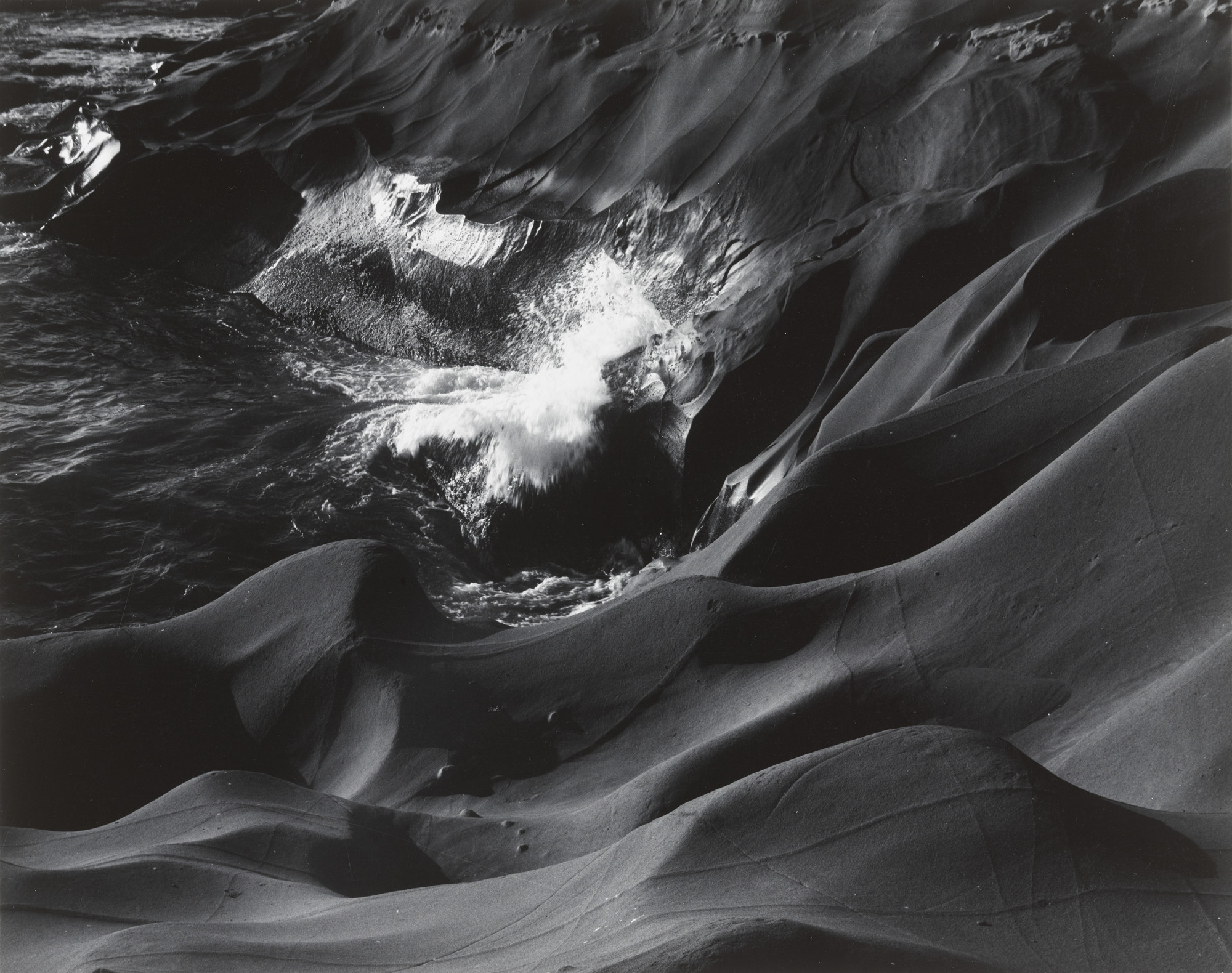Paul Caponigro. Surf and Eroded Rock, Cape Kiwanda, Oregon. 1959