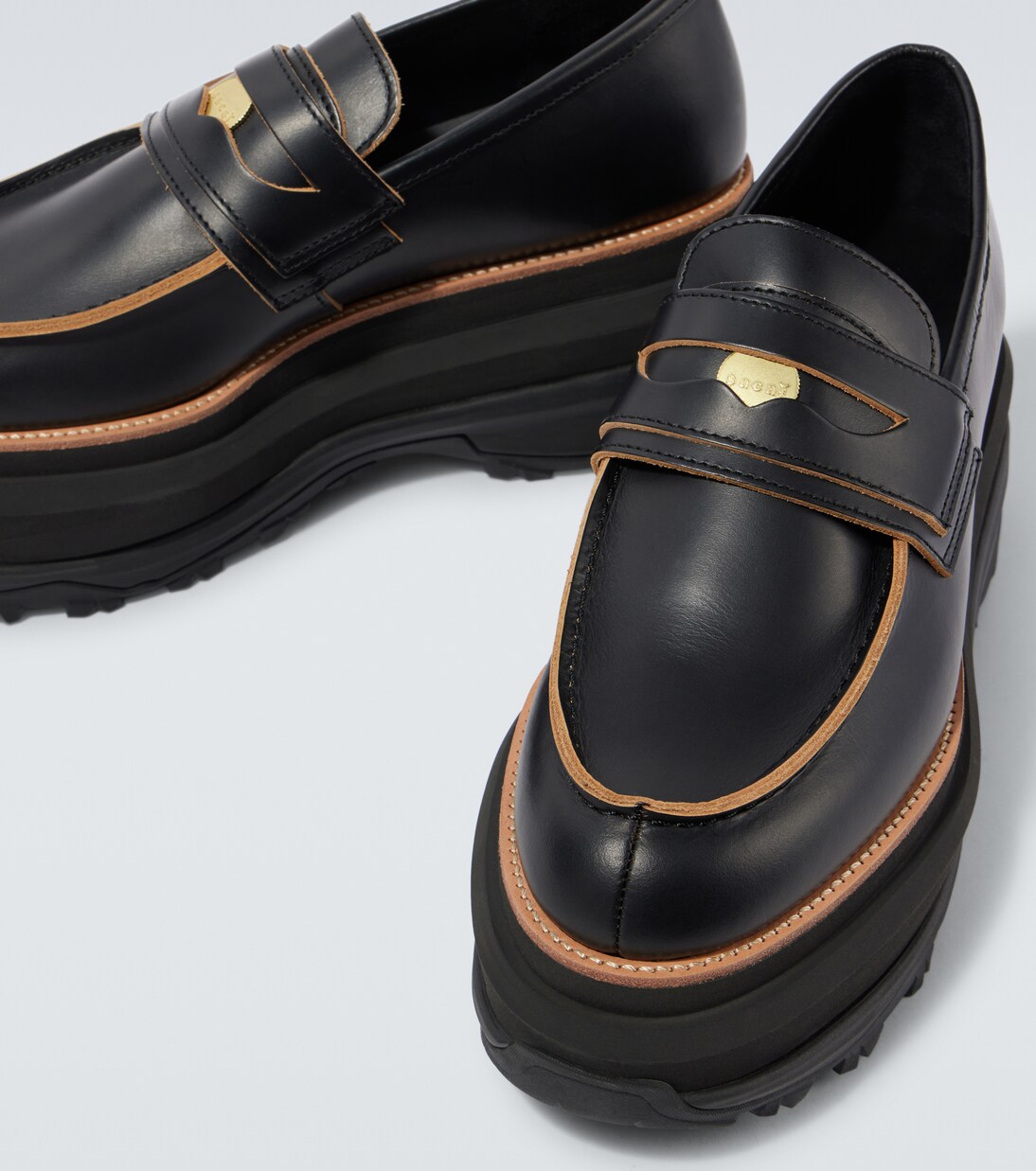 Leather platform loafers in black - Sacai | Mytheresa