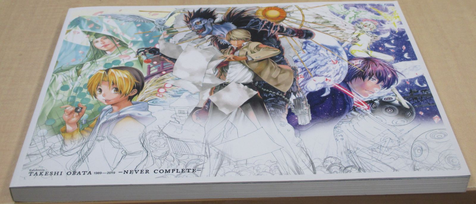 画業30周年記念 小畑健展 NEVER COMPLETE 公式図録 - メルカリ