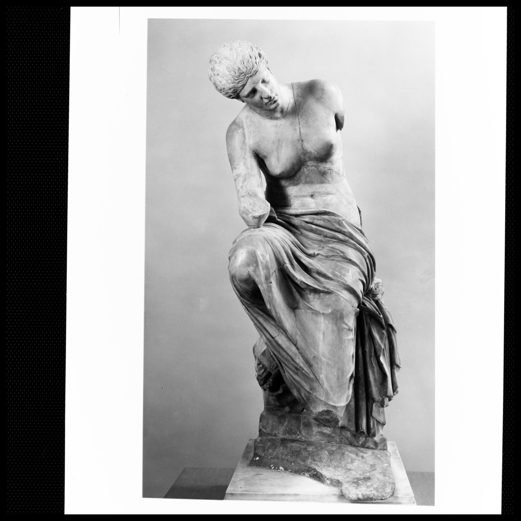 Marble statue of a seated muse : Free Download, Borrow, and