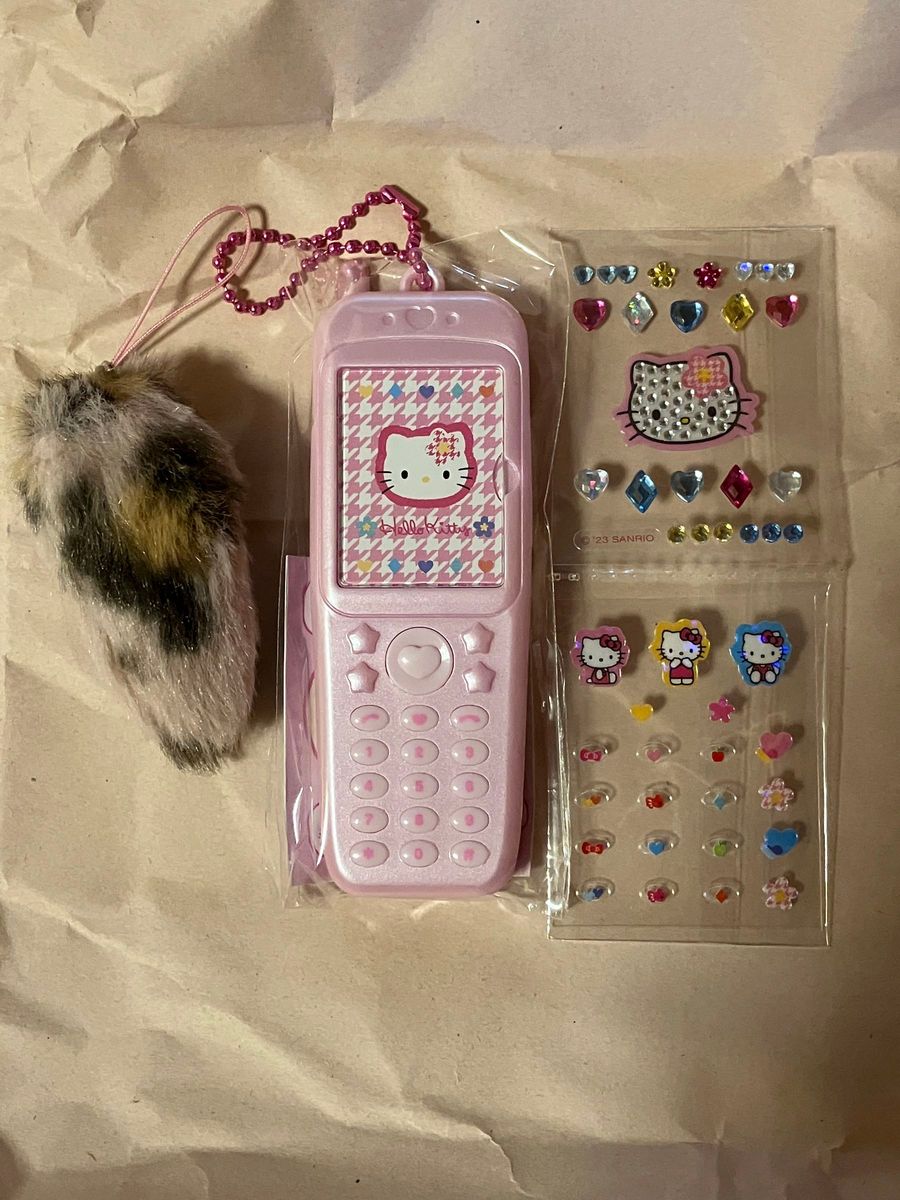 サンリオ キティちゃん えらんでガラケー フォトホルダー カオハナ