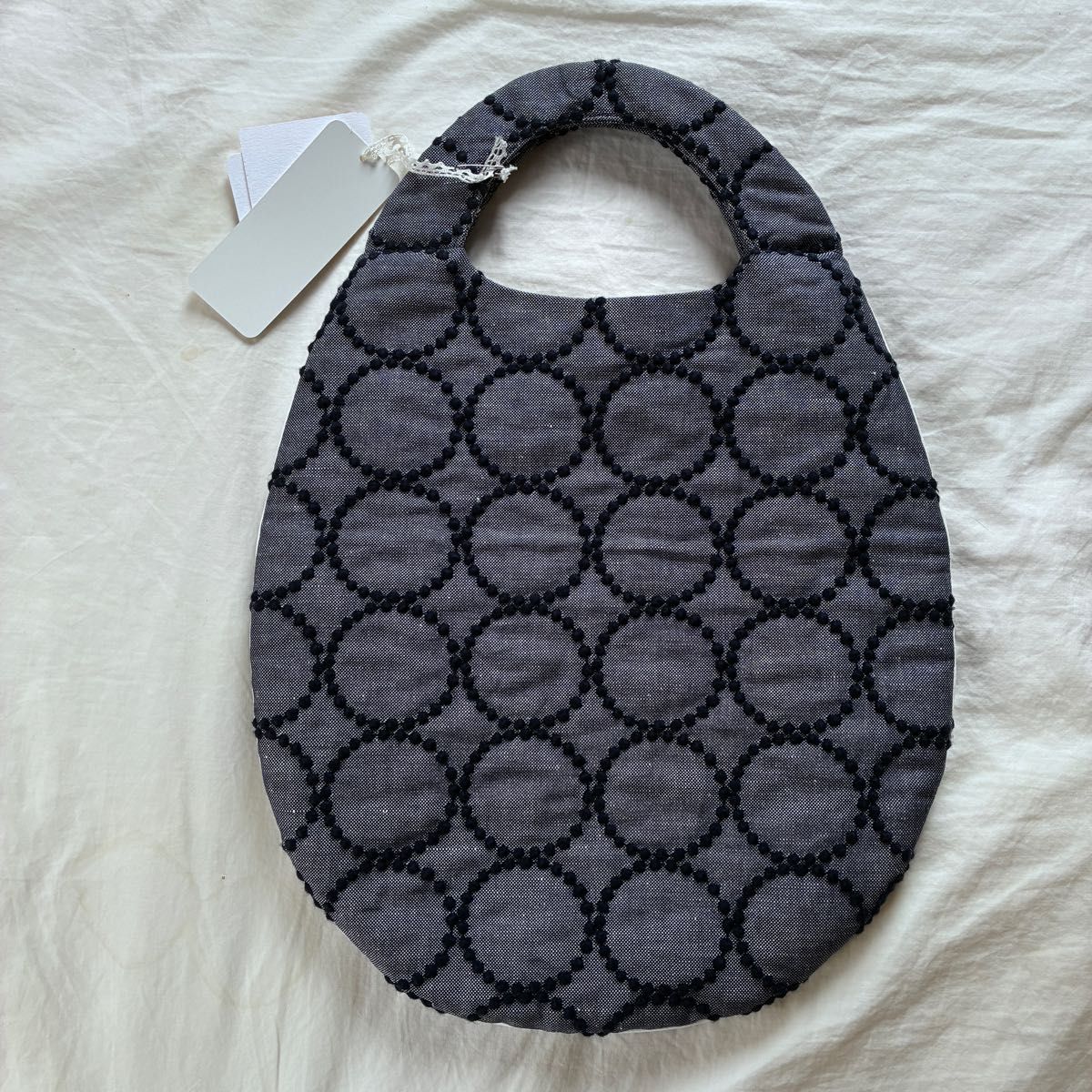 新品タグ付 ミナペルホネン タンバリン エッグバッグ ネイビー 2021SS