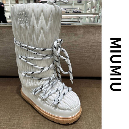 ホワイト（白）系 MiuMiu(ミュウミュウ) ブーツ(レディース