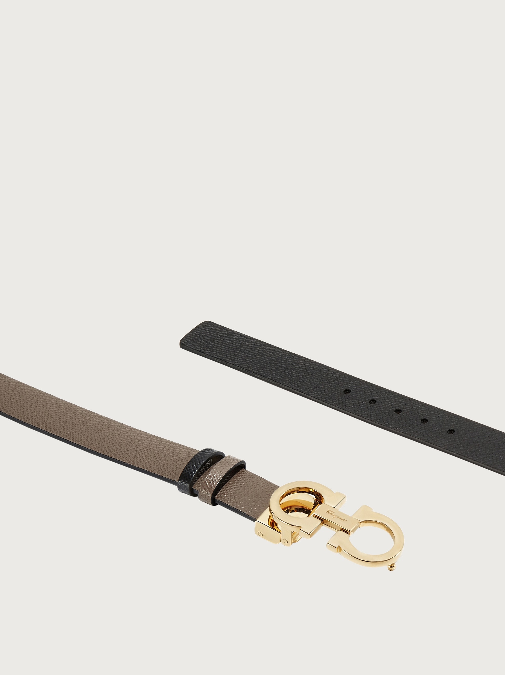 Reversible and adjustable Gancini belt - Women | Ferragamo