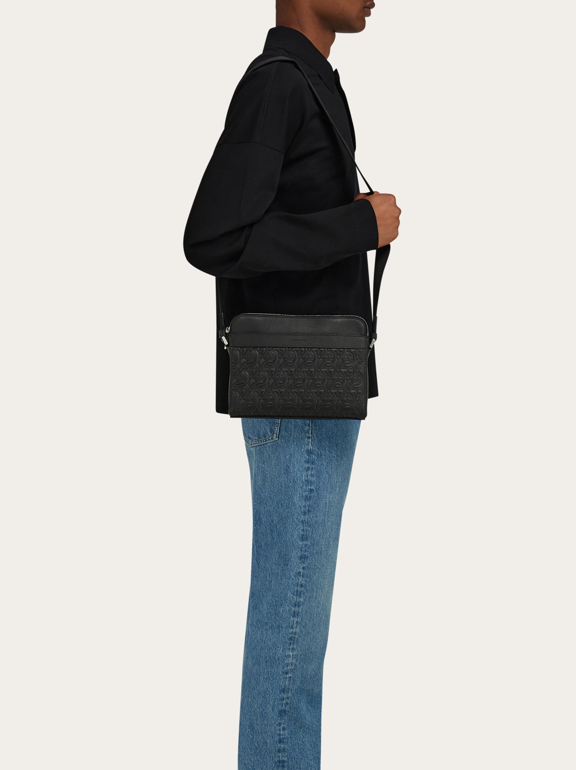 Embossed Gancini crossbody bag - Men | Ferragamo