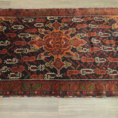 茶系のアンティークトライバルラグ ペルシアンバルーチ絨毯 オールド