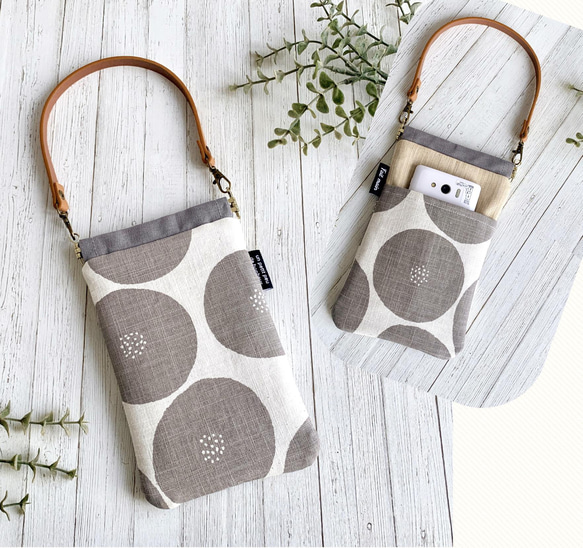 スマホ ポーチ ミニバッグ 手持ち付き 縦型 バネポーチ 北欧 トモタケ