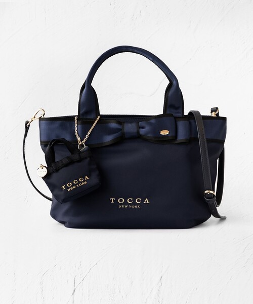 TOCCA（トッカ）の「BICOLOR RIBBON MINI CHARM ミニチャームポーチ