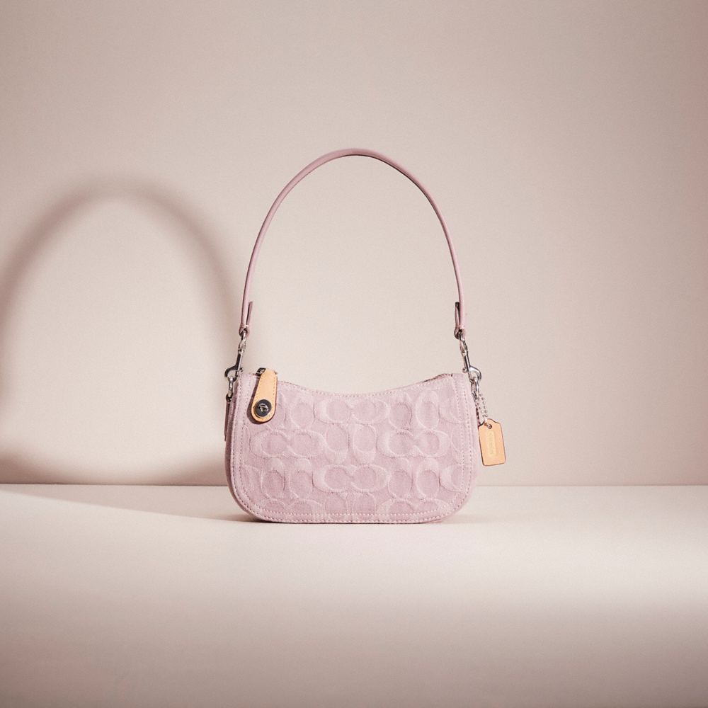 COACH® | Restored Swinger 20 In Signature Denim