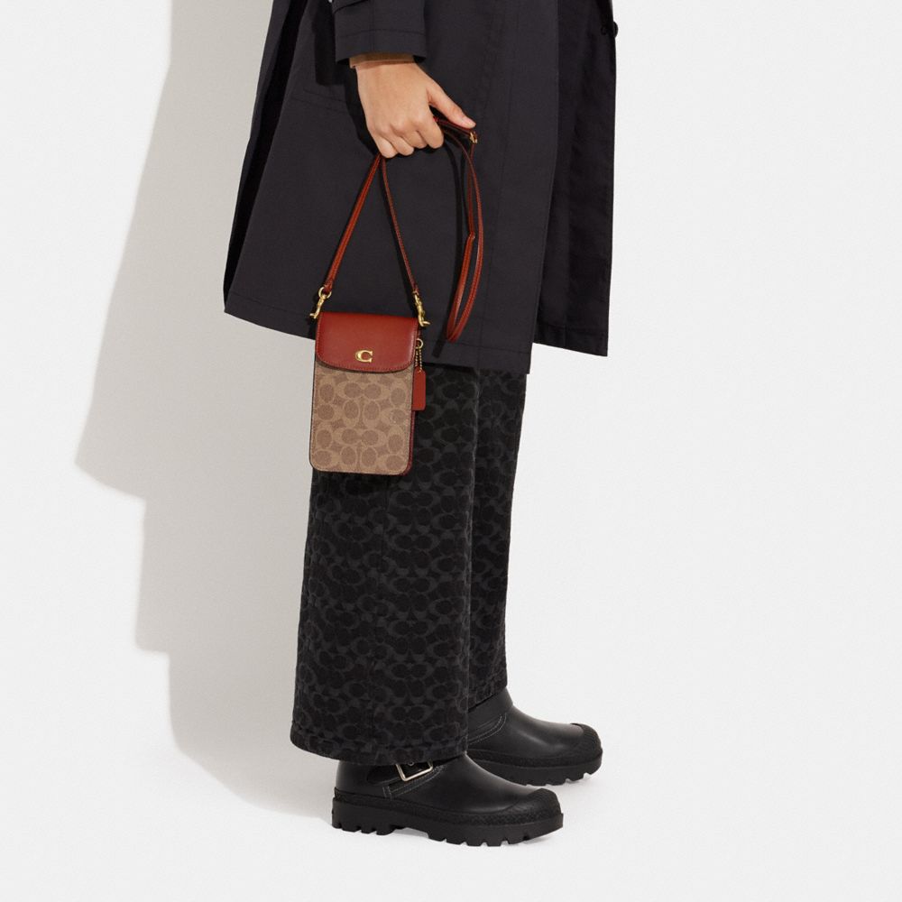 公式】COACH – コーチ | フォーン クロスボディ・シグネチャー キャンバス