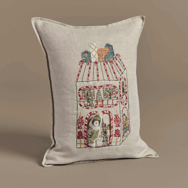 North Pole Toy Workshop Pocket Pillow | Coral & Tusk