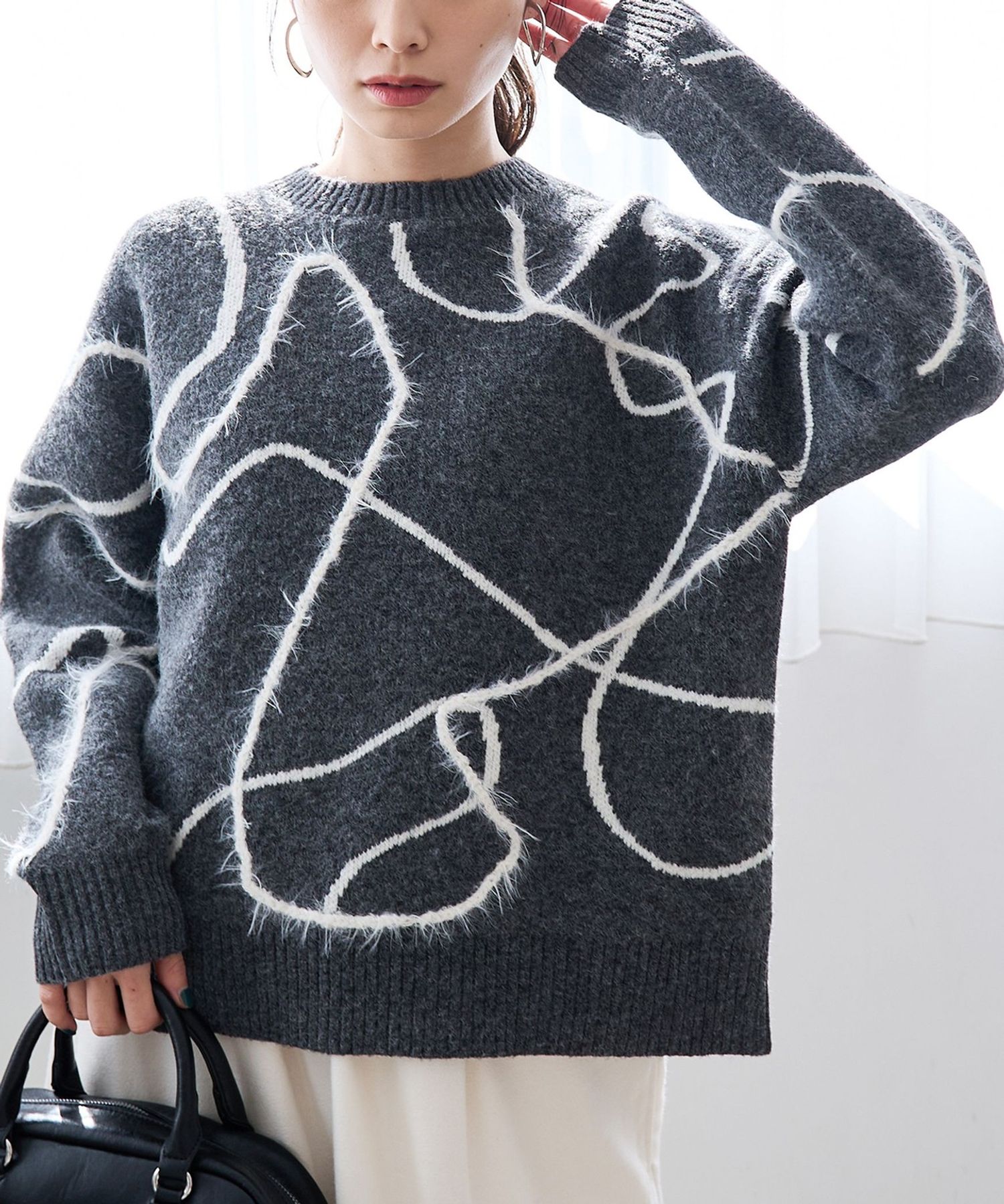 アート柄 ジャガードニュアンスニット