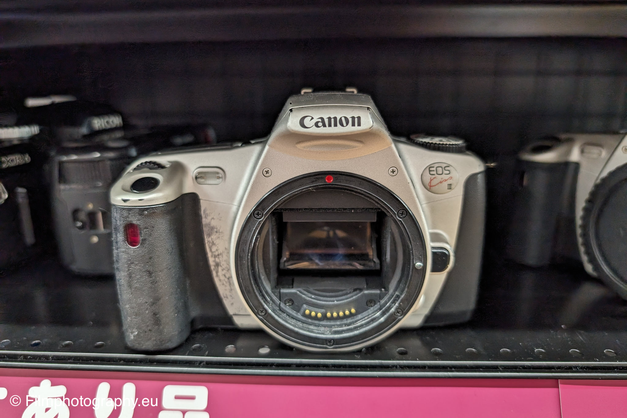 Canon EOS Kiss Lite - Features, films & batteries for the Canon