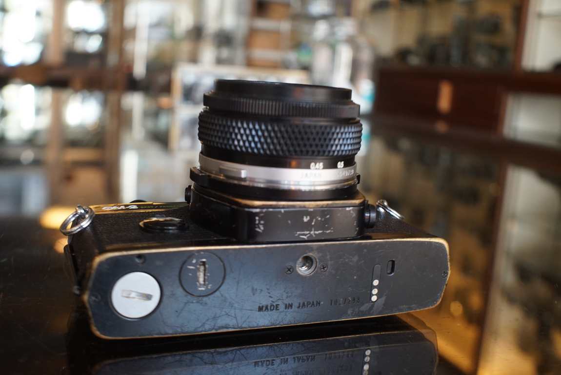 Olympus OM2 Spot/program w/ 50mm f/1.8 lens - Fotohandel