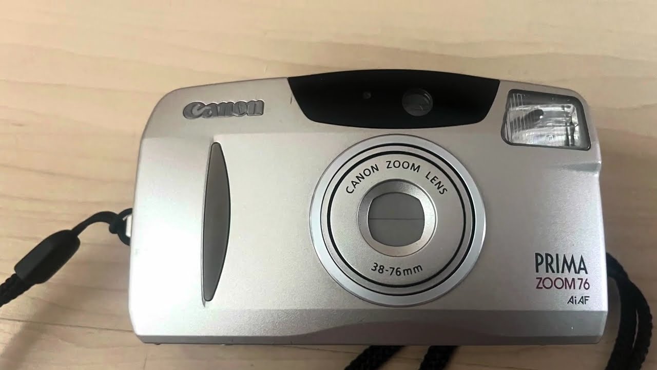 Canon Prima Zoom 76 AiAF 35mm filmroll old photo camera zoom lens