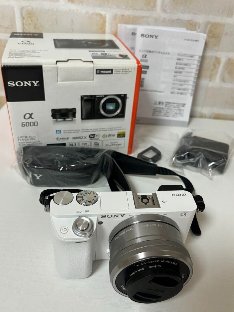 Sony A6000 White digital camera 16-50mm Lens Kit With Box - Very
