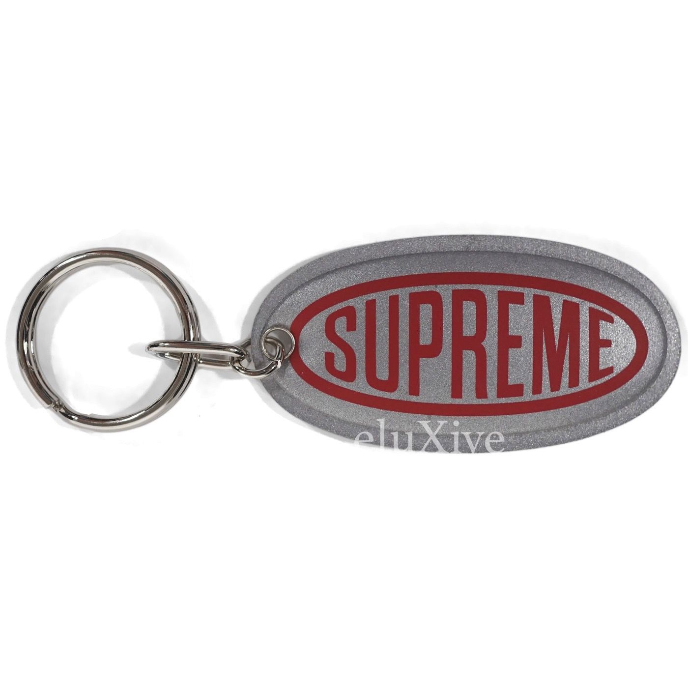 NWT Supreme NY Silver Red 3M Reflective Oval Logo Print Keychain