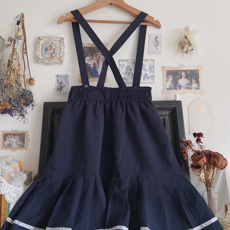 axes femme POETIQUE サス付きスカート | anonymous