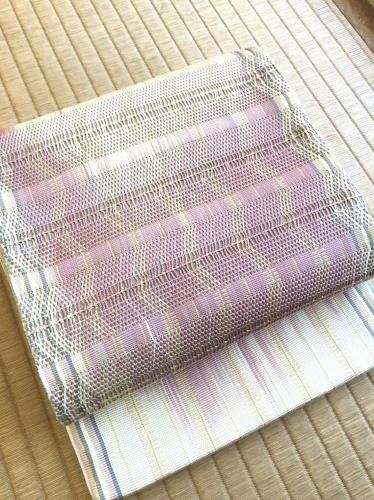 伊豆蔵明彦作 ひなや謹製 組帯 雲母桃色（裏地 羅織） - 石原呉服店