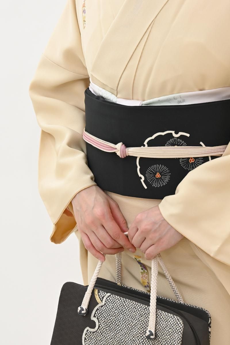 銀座【H-0892】塩瀬地 染名古屋帯 黒色 雪輪に竹や松の図（松屋扱い