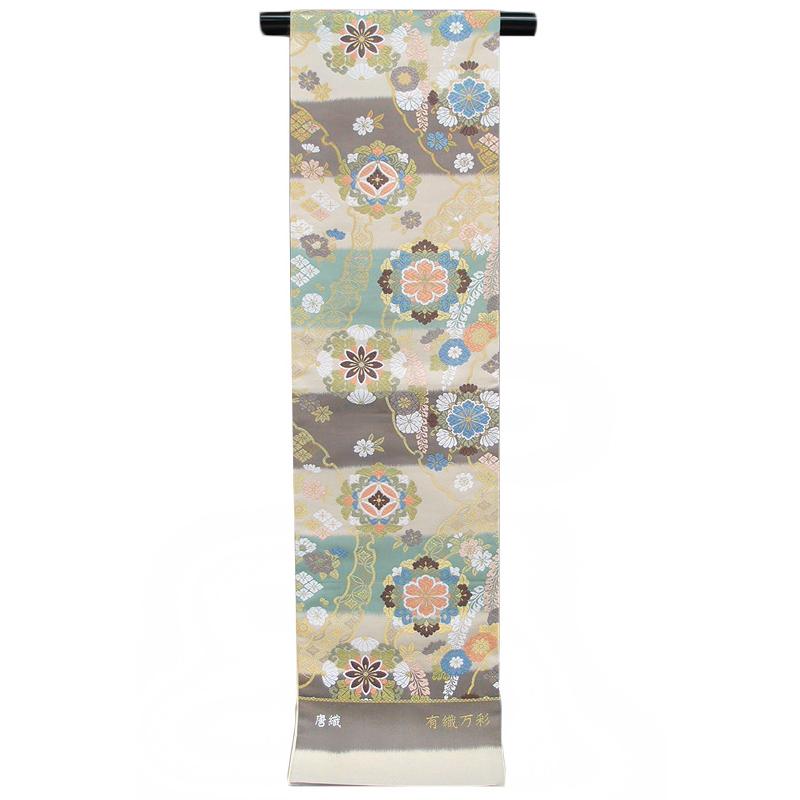 袋帯 正絹 唐織 大光 西陣織 ベージュ 横段 雪輪 華文 七宝 桜 椿 菊