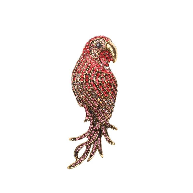 ブローチ 鳥 インコ オウム ワシ 鷲 黒 赤 ラインストーン レディース
