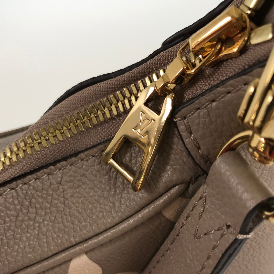 LOUIS VUITTON Monogram Empreinte Bicolor Bagatelle NM M46112