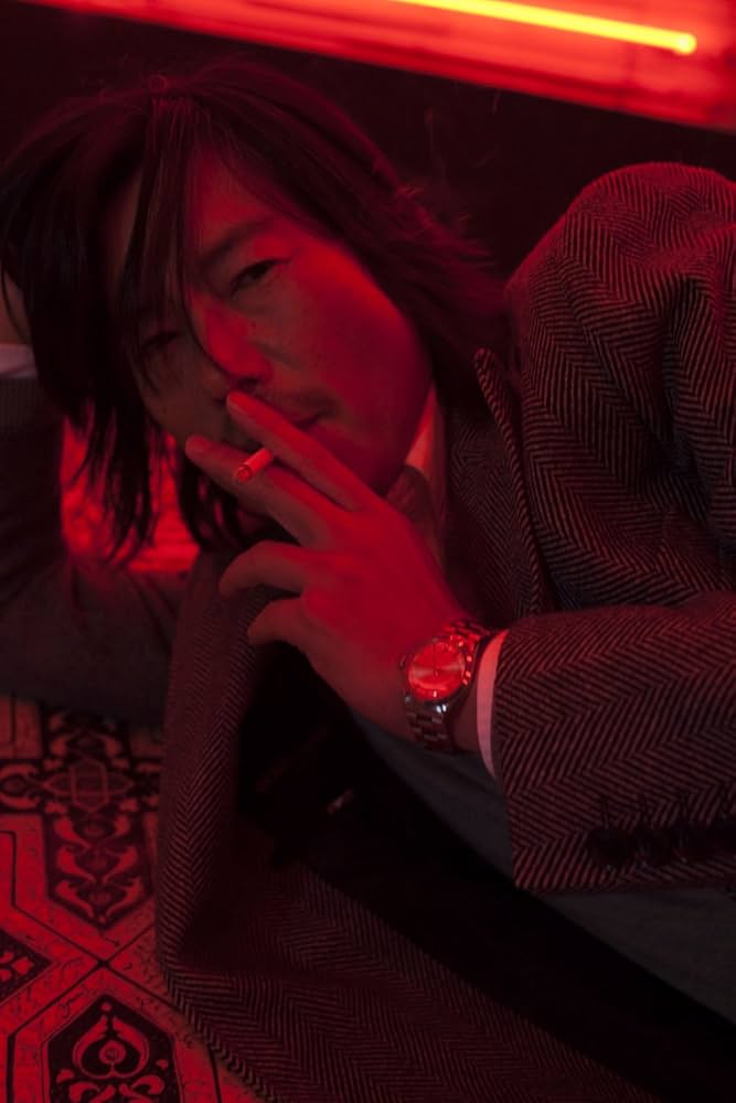 Amazon.co.jp: 豊川悦司 蜷川実花 : 蜷川実花: 本