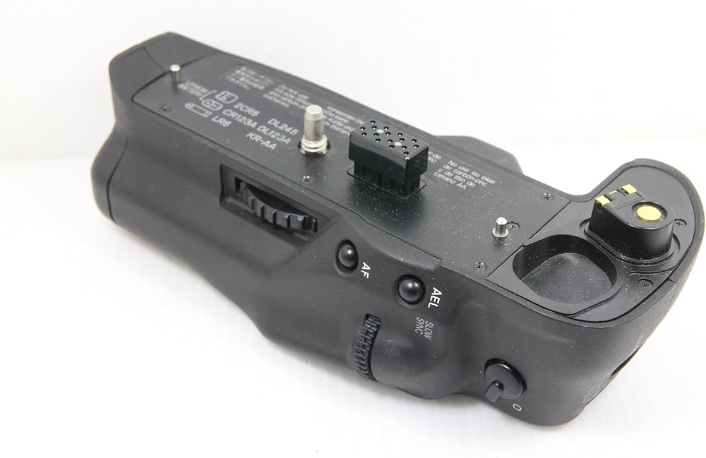 Amazon.co.jp: ミノルタ α－9用グリップ VC-9 : Electronics