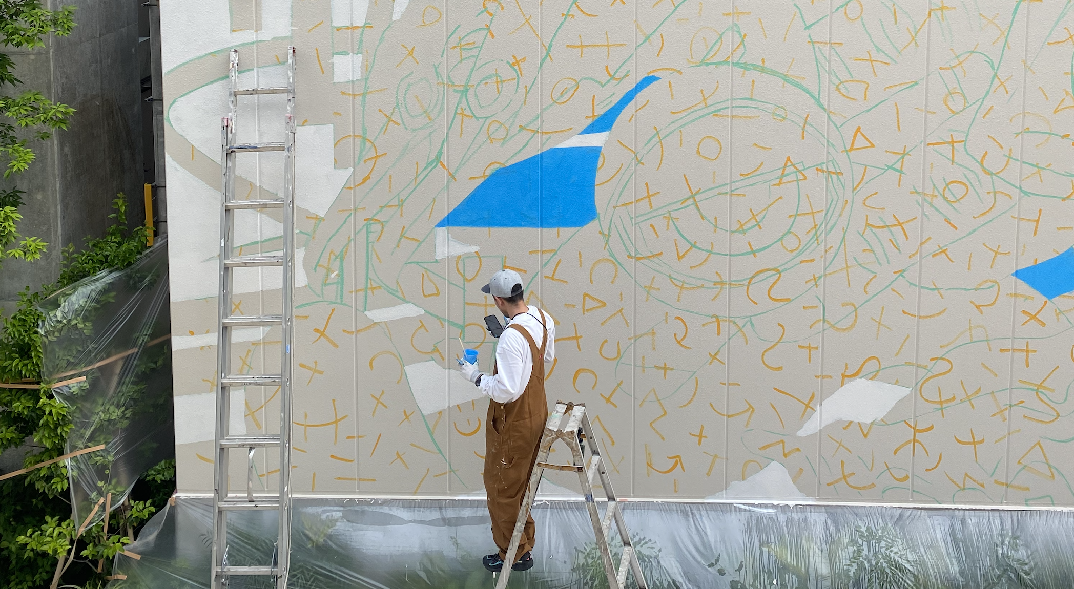 出会ったら忘れられなくなるような、胸を打つ壁画。アーティスト