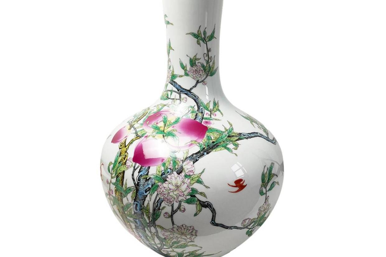 清乾隆年制款粉彩福寿九桃天球瓶_搜狐网