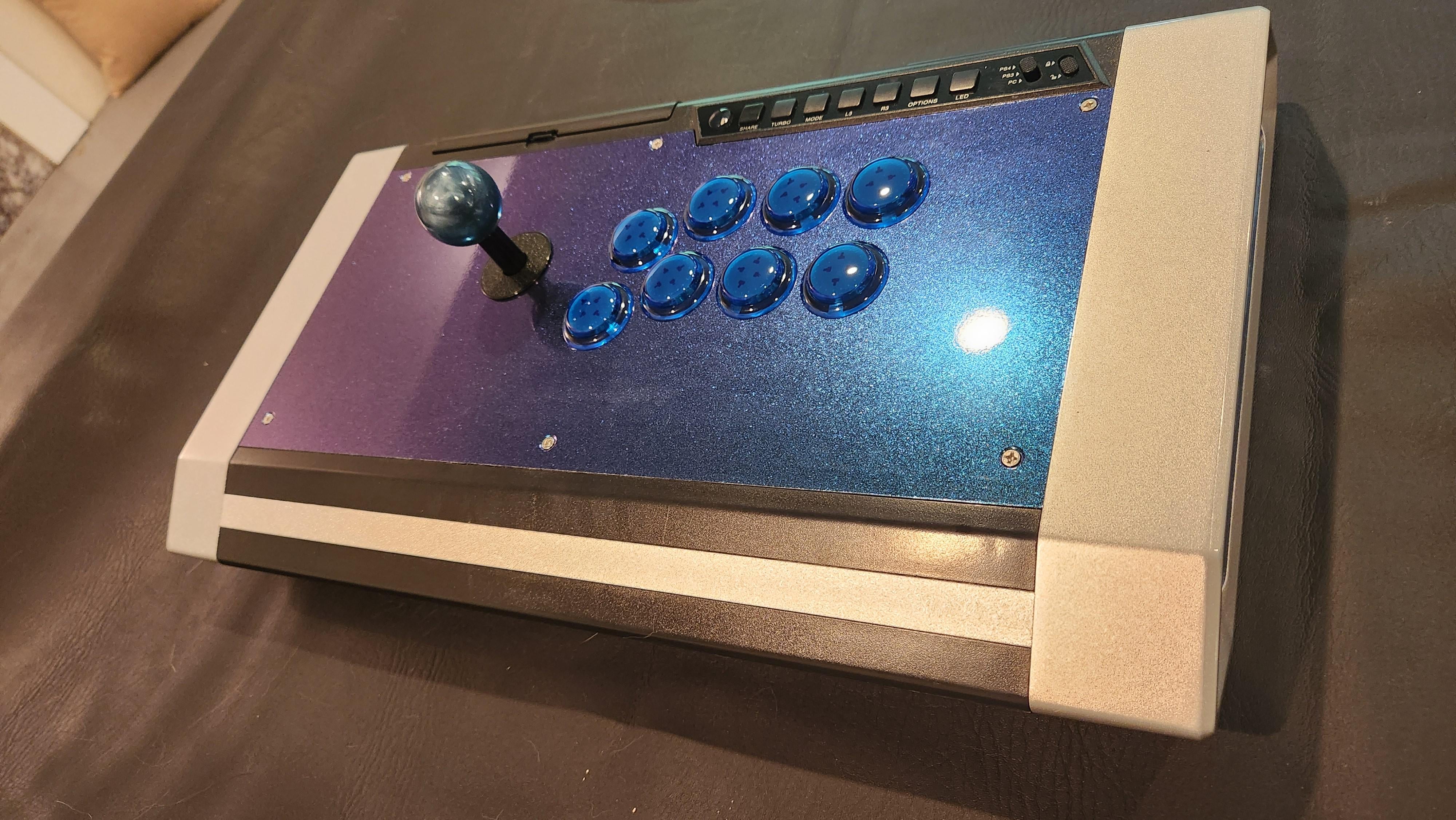 Refurbed a Qanba Obsidian. Has silent gravity buttons, a gravity