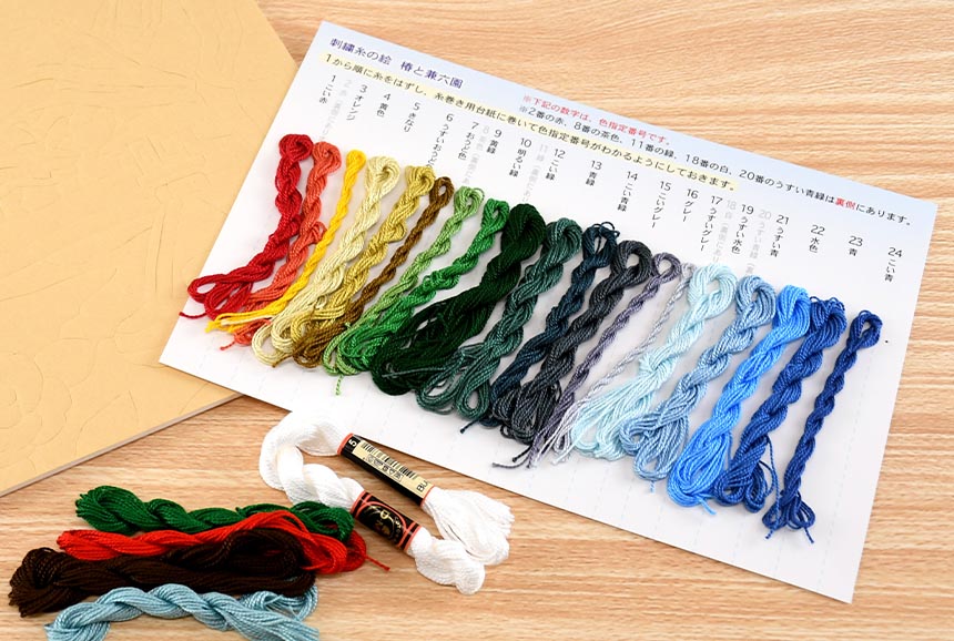 刺繍糸の絵・椿と兼六園｜株式会社さくらほりきり