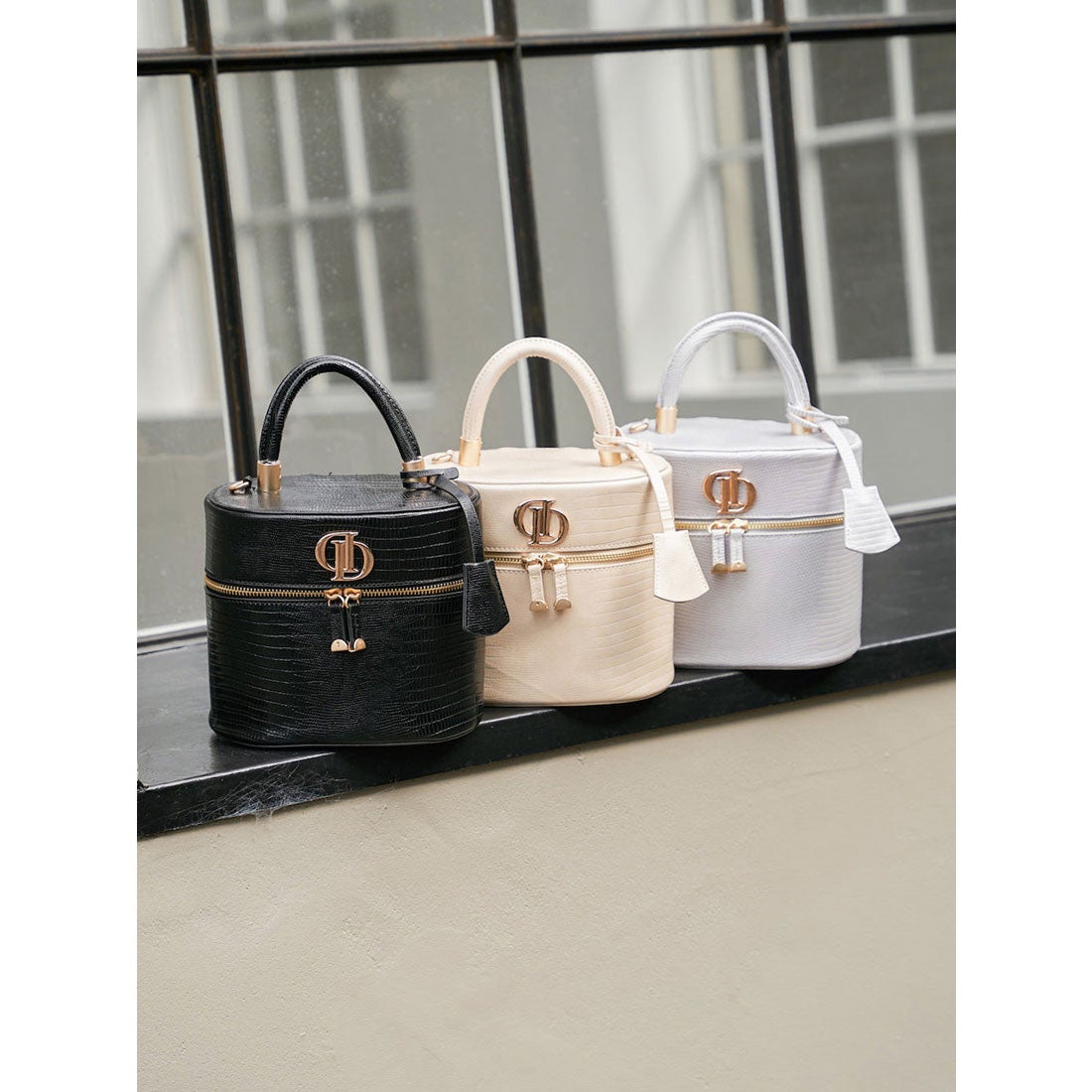 ダーリッチ Darich Dモチーフバニティポーチ （アイボリー