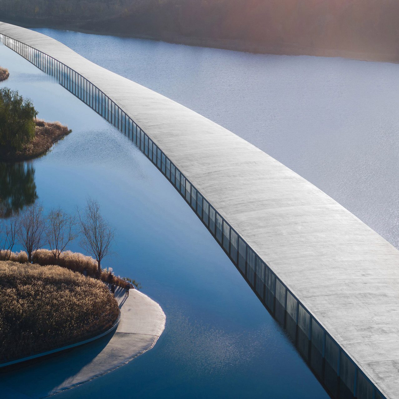 Junya Ishigami reveals one-kilometre-long museum on Chinese lake