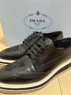 2026年最新】PRADA ウイングチップの人気アイテム - メルカリ