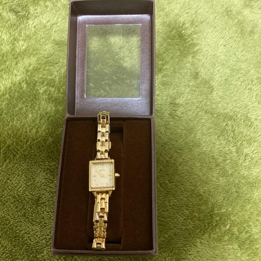 【美品】ゴールド 長方形ケース レディース時計　agete (アガット)美品 agete/アガット】 腕時計 ステンレススチール クオーツ シェル文字盤