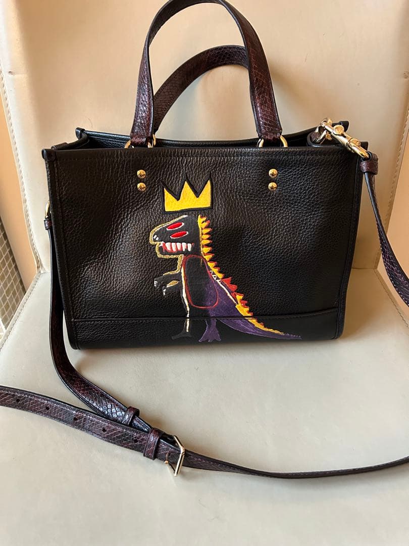 コーチバスキア恐竜バッグ - メルカリ