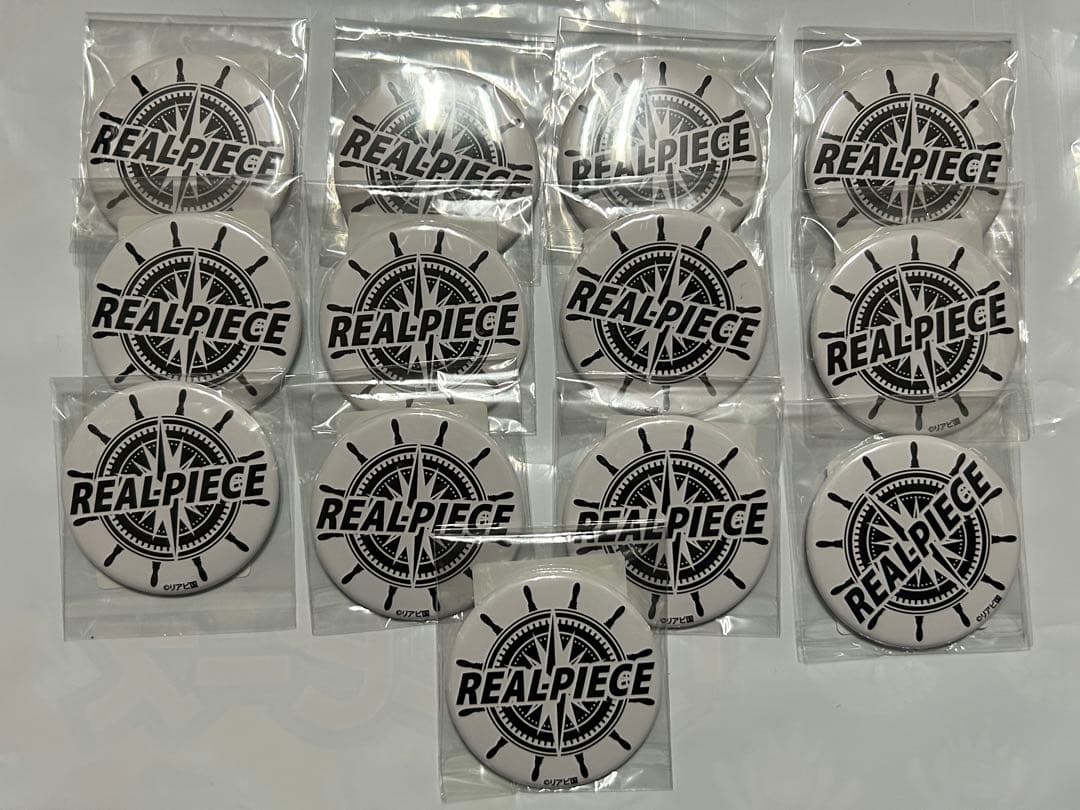 リアルピース ロゴ オンクレ 缶バッジ - メルカリ