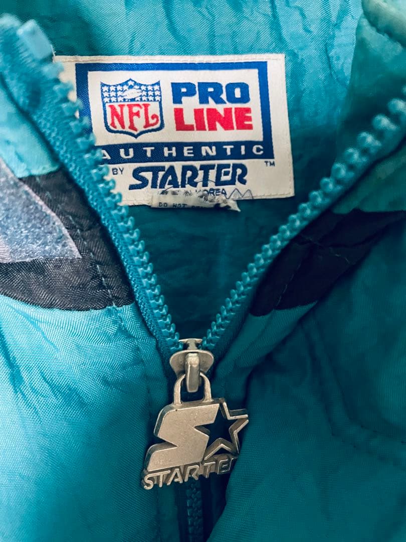 レア90s《スターター》NFLジャガーズ中綿 刺繍ナイロンジャケット