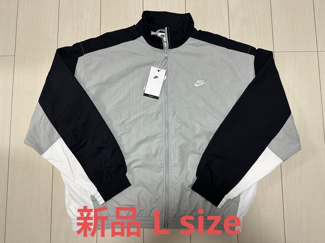 ジャケット・アウター NIKE Oversized Woven Track Jacket Shop Black Nike Club Oversized Woven Track Jacket on Sale at