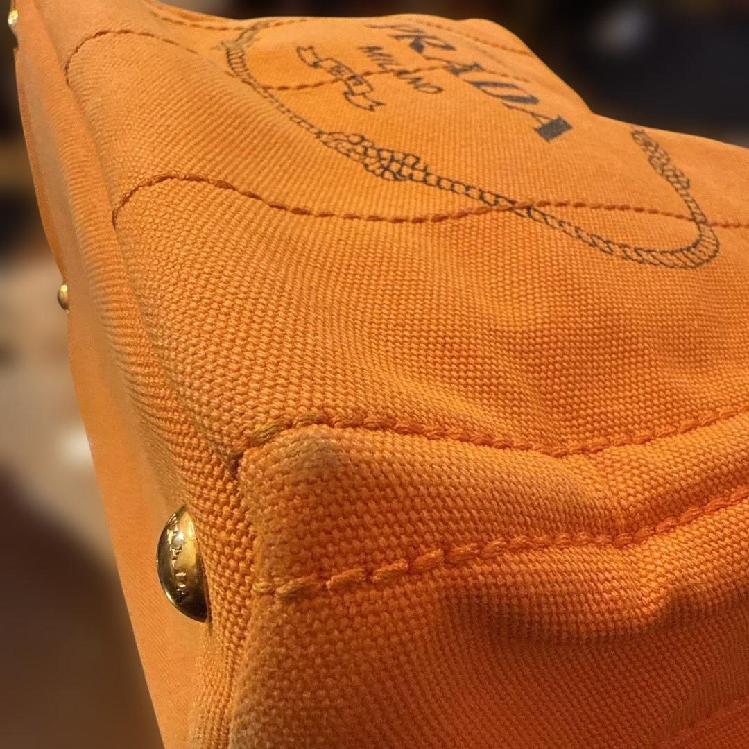 本日即決限定価格 プラダカナパミニオレンジ - メルカリ