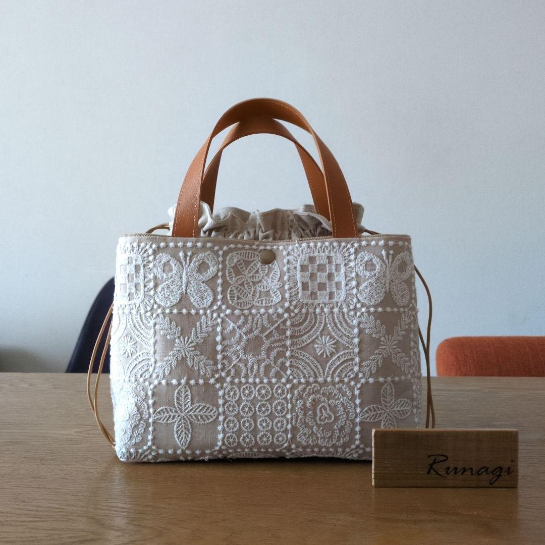 【1560】あおりポケットの巾着バッグ＊ミナペルホネン mina perhonen ミナペルホネン ads7260p lueur 巾着 ポシェット