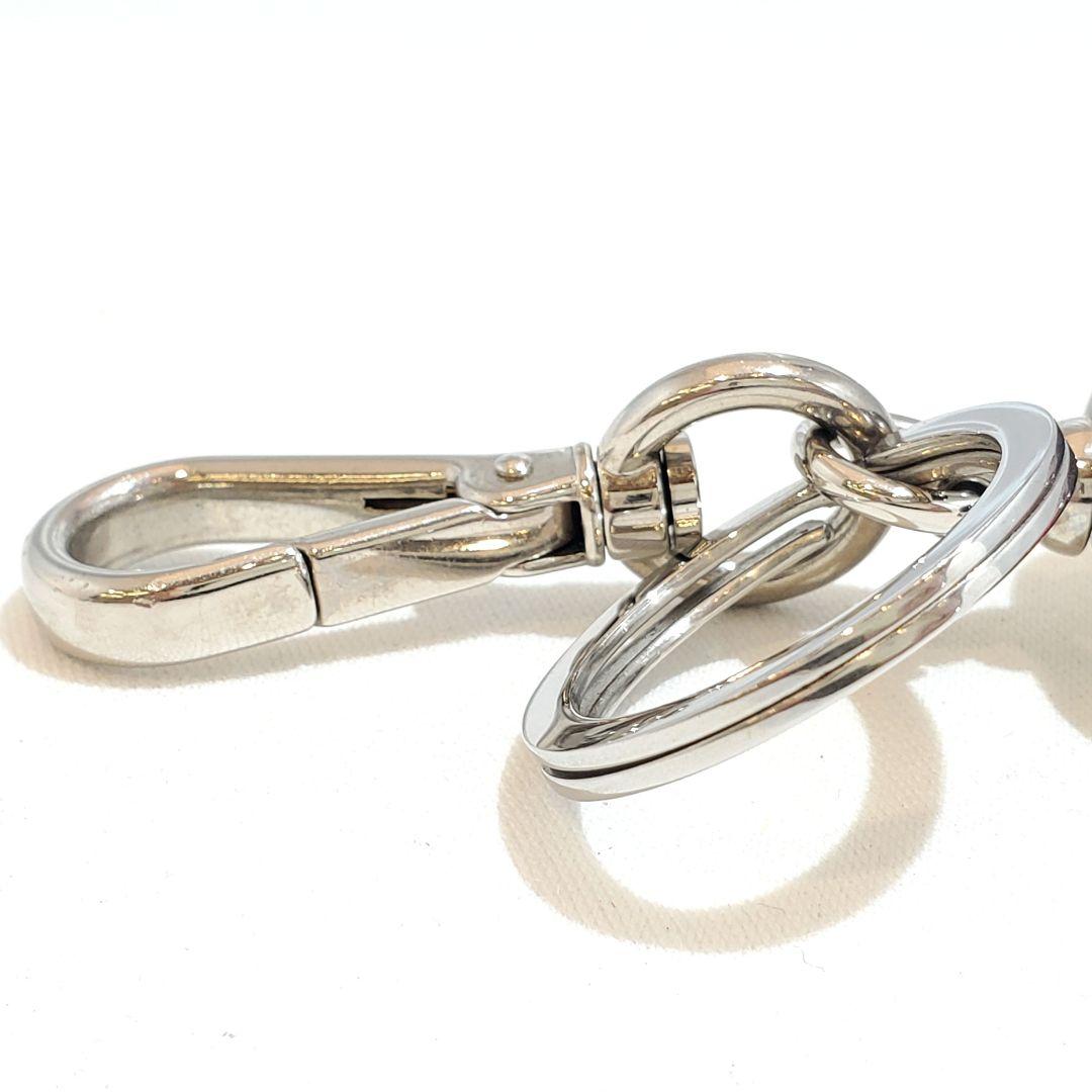 プラダ キーリング サフィアーノ ドラキュラ ロボット トリック 三角