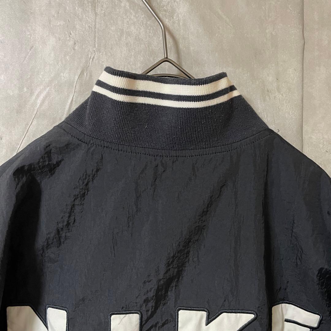 NIKEナイキナイロントラックジャケットハーフジップ黒ブラック刺繍ロゴ
